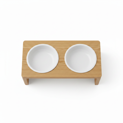 Top-down view of elevated wooden pet feeder showing both white ceramic bowls in frame